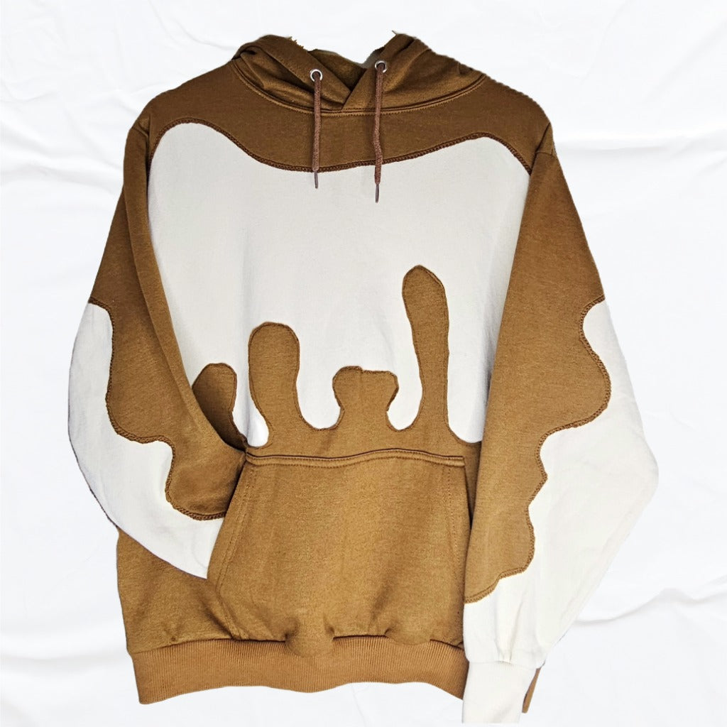 This piece features a deep chocolate upper and base that drip into a creamy off-white center, creating mirrored ripples that meet in the middle. On-of-one, Upcycled Hoodie